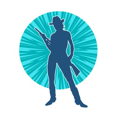 Kovboy kız kostümü giymiş siluet bir kadın tüfekle poz veriyor. Uzun namlulu ateşli silah taşıyan bir dişi kovboyun silueti..