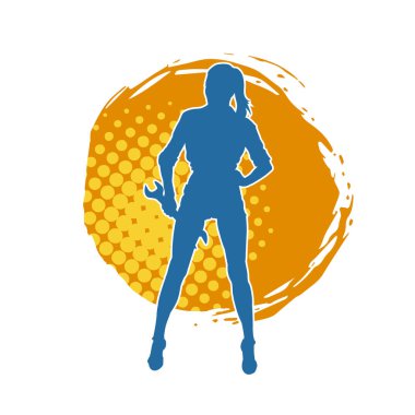 İngiliz anahtarı taşıyan zayıf bir kadının silueti. İngiliz anahtarı taşıyan bir kadın işçinin silueti..