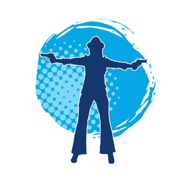 Uzun pantolon ve fötr şapka giyen zayıf bir kadın modelin silueti. Tabancayla poz veriyor..