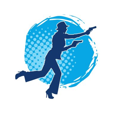 Uzun pantolon ve fötr şapka giyen zayıf bir kadın modelin silueti. Tabancayla poz veriyor..