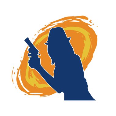 Uzun pantolon ve fötr şapka giyen zayıf bir kadın modelin silueti. Tabancayla poz veriyor..