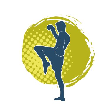Hareketli erkek kickboksör atletinin silueti. Tekme atan bir adamın silueti..