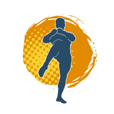 Hareketli erkek kickboksör atletinin silueti. Tekme atan bir adamın silueti..