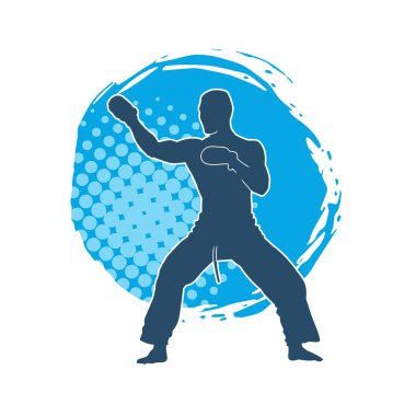 Erkek boks atletinin silueti iş başında. Boks sporu için eldiven giyen kaslı bir adamın silueti..