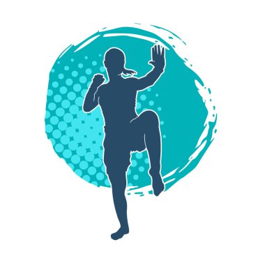Hareketli kadın kickboksör atletinin silueti. Tekme atan bir kadının silueti..