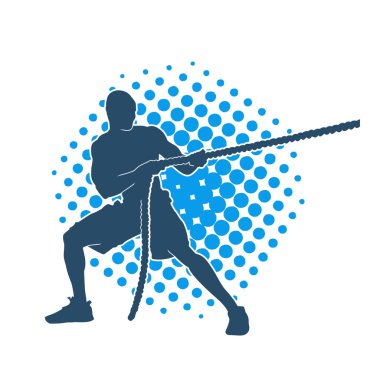 Sportif bir adamın silueti savaş halatıyla egzersiz yapıyor. 