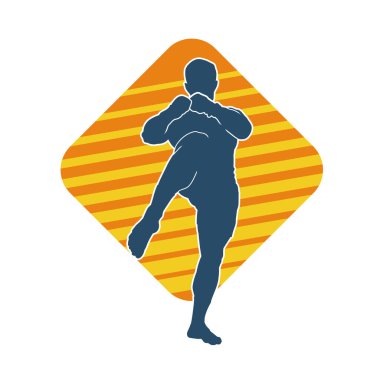 Hareketli erkek kickboksör atletinin silueti. Tekme atan bir adamın silueti..