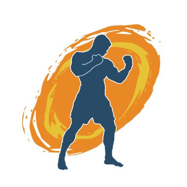 Hareketli erkek kickboksör atletinin silueti. Tekme atan bir adamın silueti..