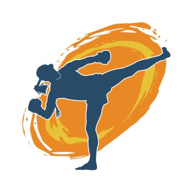 Hareketli erkek kickboksör atletinin silueti. Tekme atan bir adamın silueti..