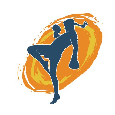 Hareketli erkek kickboksör atletinin silueti. Tekme atan bir adamın silueti..