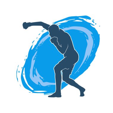 Erkek boks atletinin silueti iş başında. Boks sporu için eldiven giyen kaslı bir adamın silueti..