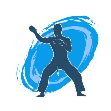 Erkek boks atletinin silueti iş başında. Boks sporu için eldiven giyen kaslı bir adamın silueti..