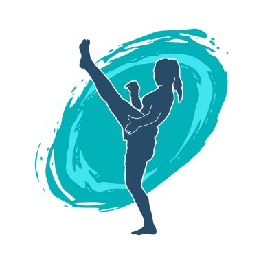 Hareketli kadın kickboksör atletinin silueti. Tekme atan bir kadının silueti..