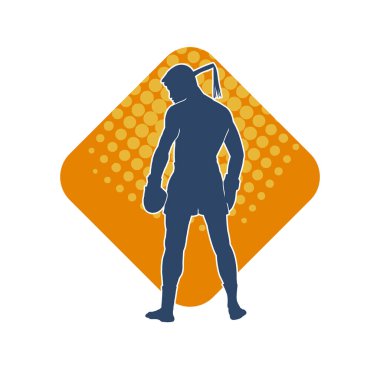 Hareketli erkek kickboksör atletinin silueti. Tekme atan bir adamın silueti..