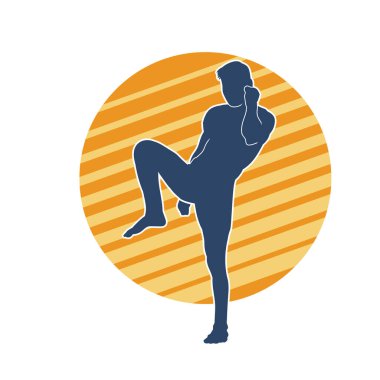 Hareketli erkek kickboksör atletinin silueti. Tekme atan bir adamın silueti..