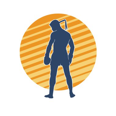 Hareketli erkek kickboksör atletinin silueti. Tekme atan bir adamın silueti..