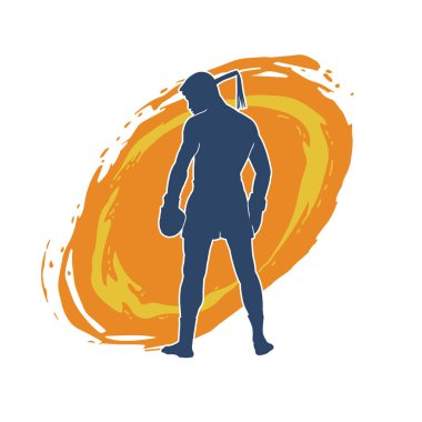 Hareketli erkek kickboksör atletinin silueti. Tekme atan bir adamın silueti..