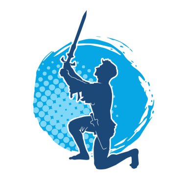 Erkek bir kılıç ustasının silueti kılıçla hareket halinde.