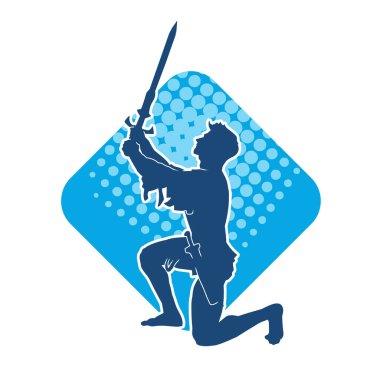 Erkek bir kılıç ustasının silueti kılıçla hareket halinde.