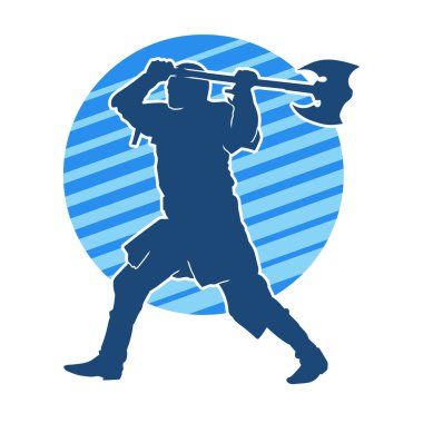 Muharebe halindeki bir savaşçının silueti savaş baltası ile poz veriyor.