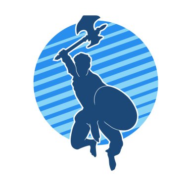 Muharebe halindeki bir savaşçının silueti savaş baltası ve demir kalkanla poz verir.