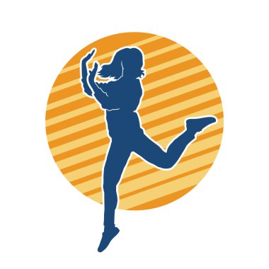 Hareketli bir kadın dansçının silueti. Mutlu dans eden bir kadının silueti..