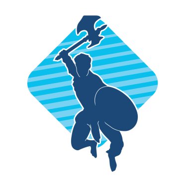 Muharebe halindeki bir savaşçının silueti savaş baltası ve demir kalkanla poz verir.