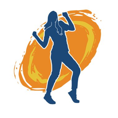 Hareketli bir kadın dansçının silueti. Mutlu dans eden bir kadının silueti..