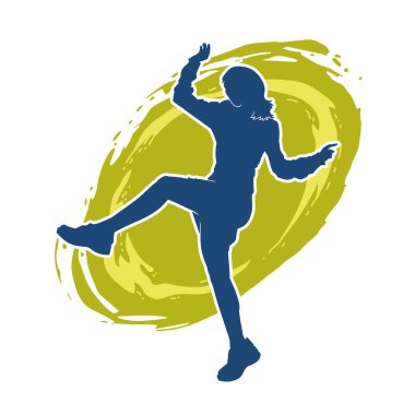 Hareketli bir kadın dansçının silueti. Mutlu dans eden bir kadının silueti..