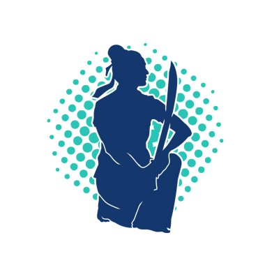 Bir kadın savaşçının silueti kılıç ile hareket halindeyken poz veriyor. Kılıcıyla bir kadın kahramanın silüeti..