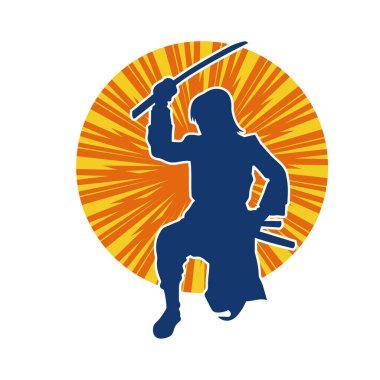 Samuray bir savaşçının silueti. Katana kılıcıyla poz veriyor.