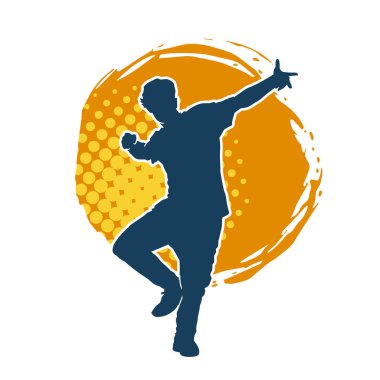 Hareket halindeki bir erkek dansçının silueti. Dans eden zayıf bir adamın silueti..