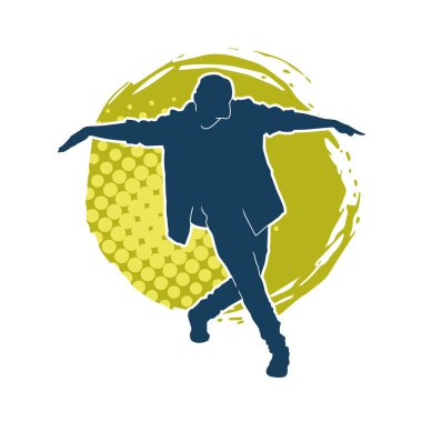 Hareket halindeki bir erkek dansçının silueti. Dans eden zayıf bir adamın silueti..