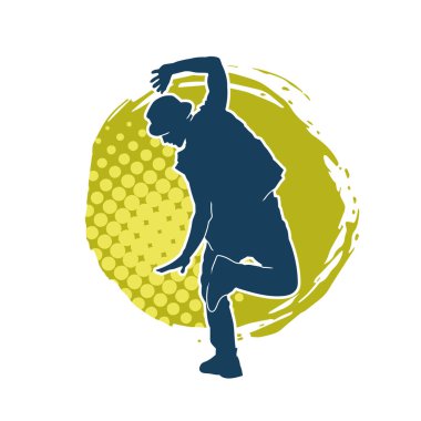 Hareket halindeki bir erkek dansçının silueti. Dans eden zayıf bir adamın silueti..