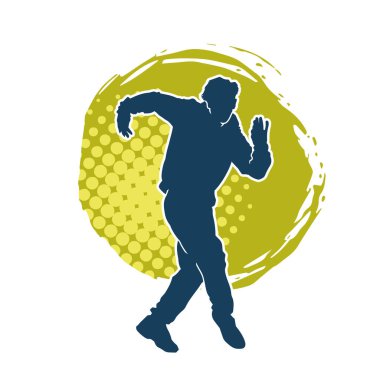 Hareket halindeki bir erkek dansçının silueti. Dans eden zayıf bir adamın silueti..