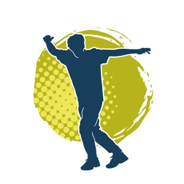 Poz veren bir erkek dansçının silueti. Dans eden bir adamın silueti.