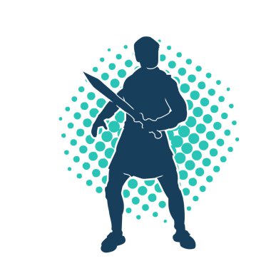 Bir erkek savaşçının silueti kılıçla poz veriyor. Kılıç taşıyan bir savaşçının silueti..