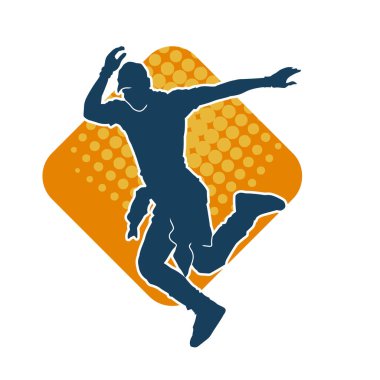 Hareket halindeki bir erkek dansçının silueti. Dans eden zayıf bir adamın silueti..