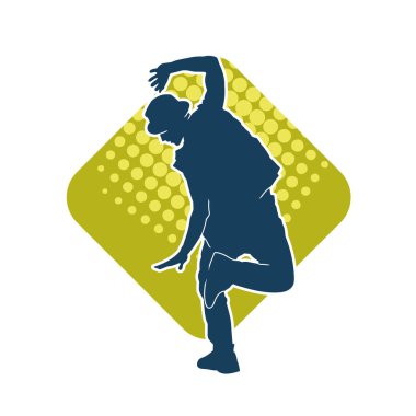 Hareket halindeki bir erkek dansçının silueti. Dans eden zayıf bir adamın silueti..