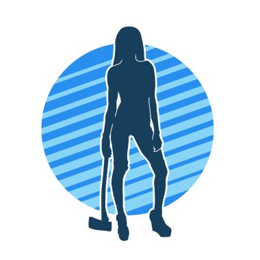 Sümüklü bir kadın savaşçının silüeti balta ile hareket halindeyken poz veriyor..