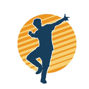 Hareket halindeki bir erkek dansçının silueti. Dans eden zayıf bir adamın silueti..