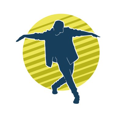 Hareket halindeki bir erkek dansçının silueti. Dans eden zayıf bir adamın silueti..