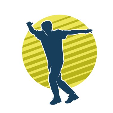 Hareket halindeki bir erkek dansçının silueti. Dans eden zayıf bir adamın silueti..