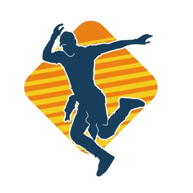 Hareket halindeki bir erkek dansçının silueti. Dans eden zayıf bir adamın silueti..