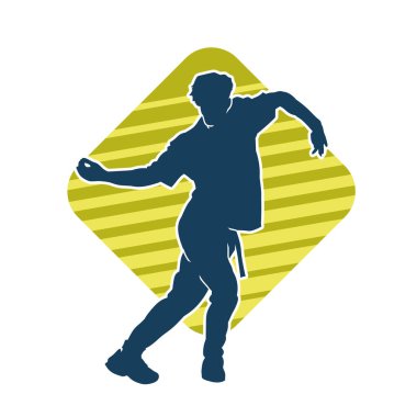 Hareket halindeki bir erkek dansçının silueti. Dans eden zayıf bir adamın silueti..