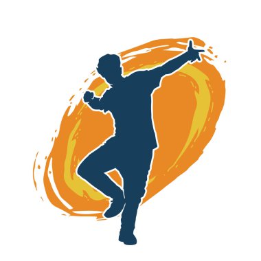 Hareket halindeki bir erkek dansçının silueti. Dans eden zayıf bir adamın silueti..