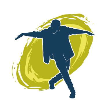 Hareket halindeki bir erkek dansçının silueti. Dans eden zayıf bir adamın silueti..