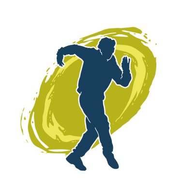 Hareket halindeki bir erkek dansçının silueti. Dans eden zayıf bir adamın silueti..