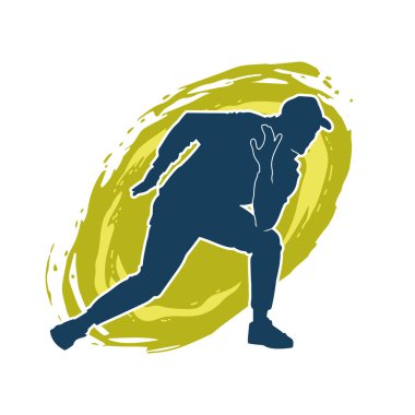 Hareket halindeki bir erkek dansçının silueti. Dans eden zayıf bir adamın silueti..