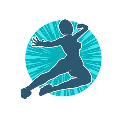Dövüş sanatları tekmesi atan bir kadının silueti. Sportif bir kadının silueti tekme hareketi yapıyor..